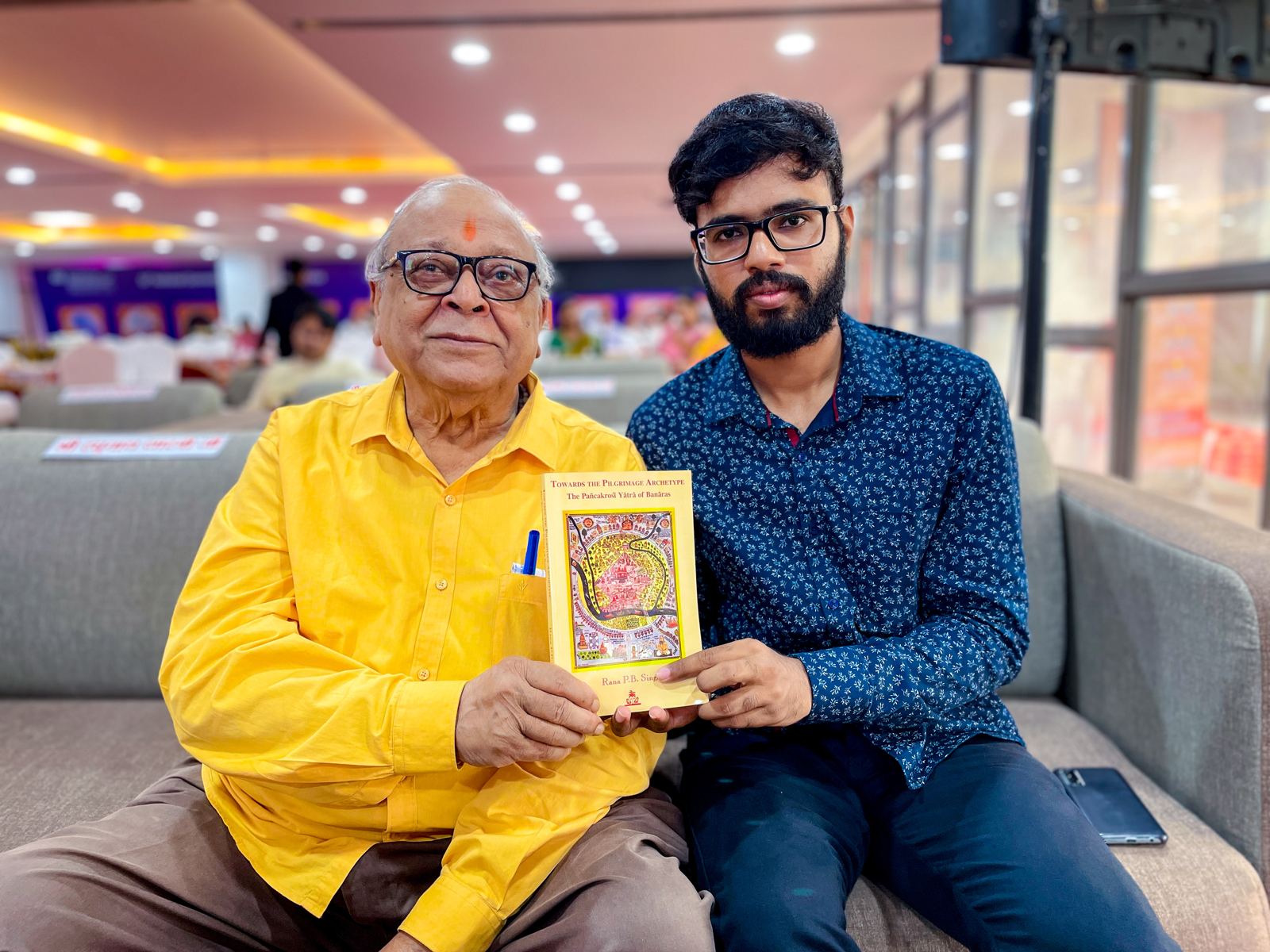 Inderneel with Dr. Rana P.B. Singh holding the signed Panchkoshi Yatra book